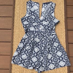Blue patterned romper.